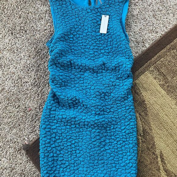 Anthropologie sinched Teal Textured Sleeveless Mini Dress tight at the bottom - Picture 10 of 12